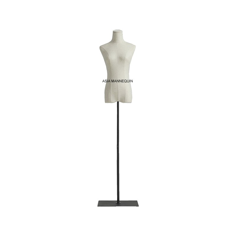 Torso dress form with a seamed cover on a dark upright with a flat rectangular base.