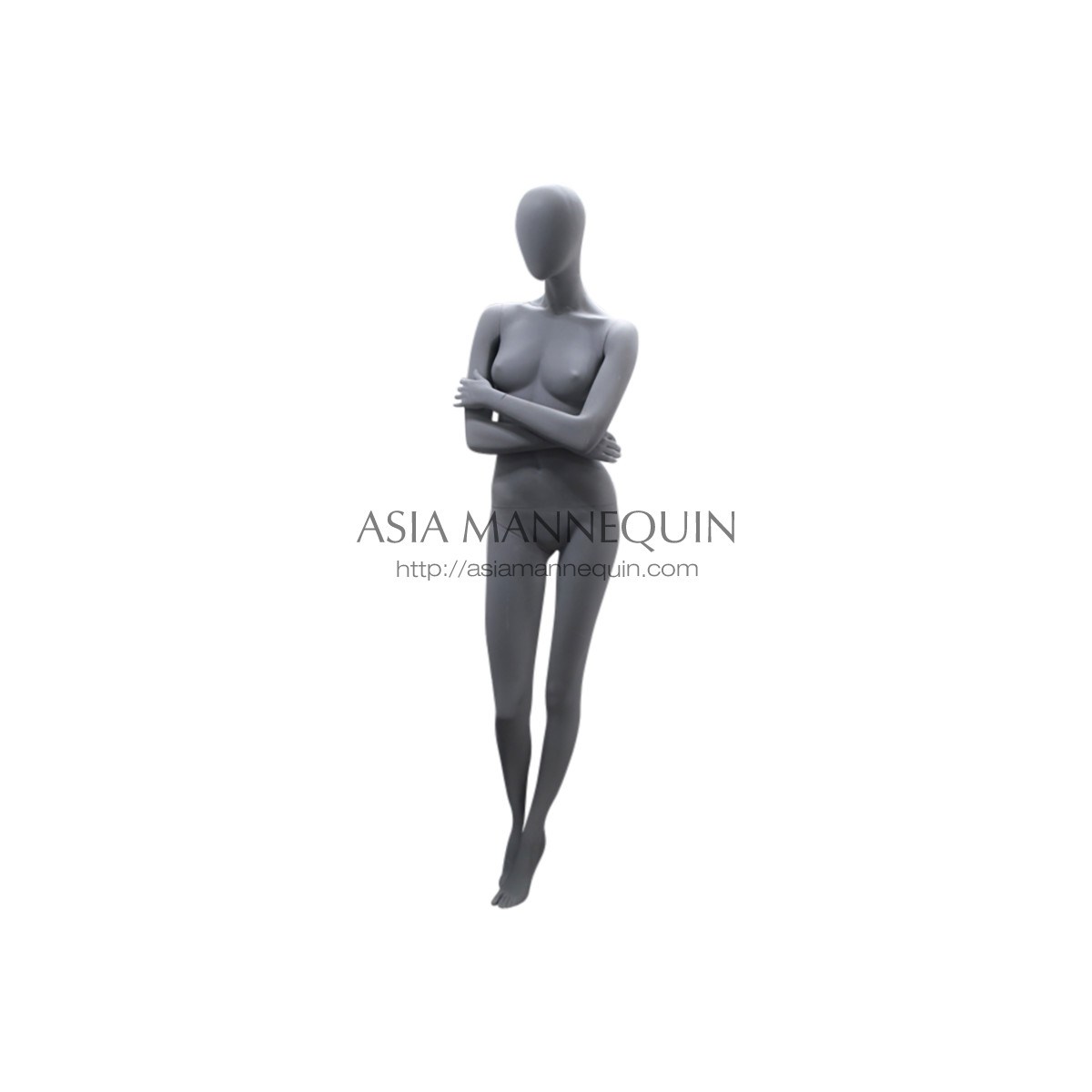 A gray mannequin posing on a white background.