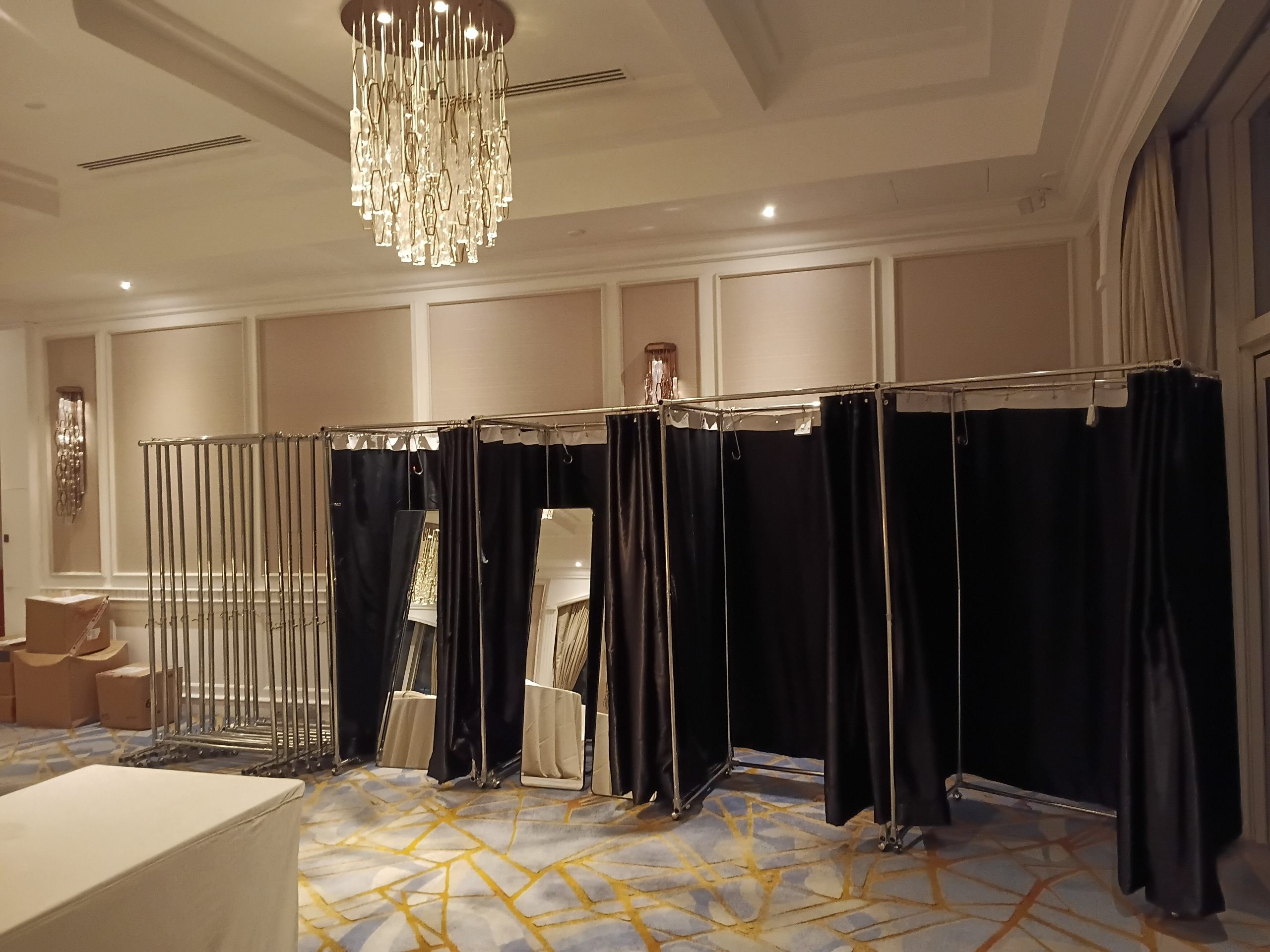 Fitting rooms with black curtains